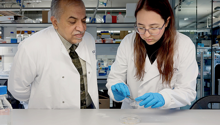 Professor Abhay Pandit pictured in the lab with PhD candidate Patricia Bocanegra Lopez. Credit – Uni