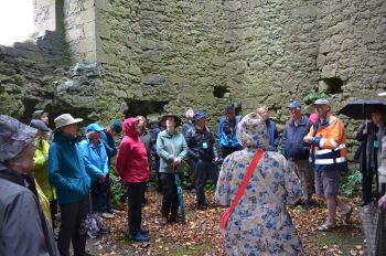 Tour of Ballintober Castle by Dr Niall Brady as part of the RSAI Explorers' Excursion, summer, 6 July 2023. 
