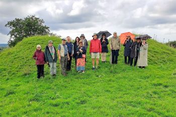 Tour of Rathra multivallate enclosure, near Castlerea, Co. Roscommon, as part of the RSAI Explorers' Excursion Summer 2023 (5 July 2023) led by Joe Fenwick, Archaeology, University of Galway. 